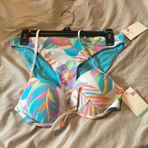 Brand new bikini set. New with tags size medium. Reversible bottoms.